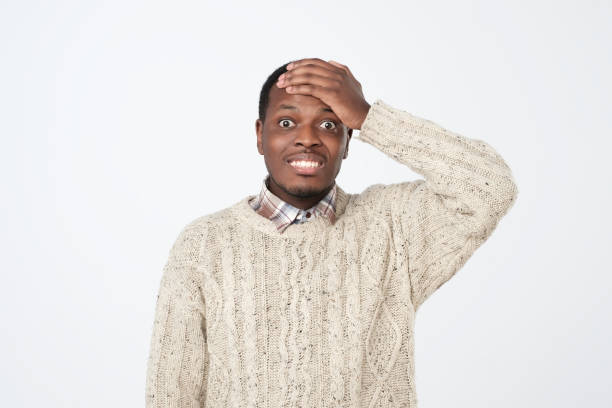 istock Surprised young handsome african guy with admire on his face 1069722466