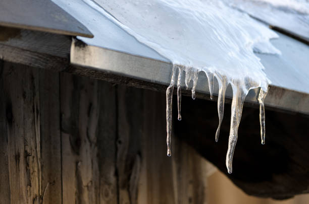 istock Ice stalactites hanging from the roof 1069723990