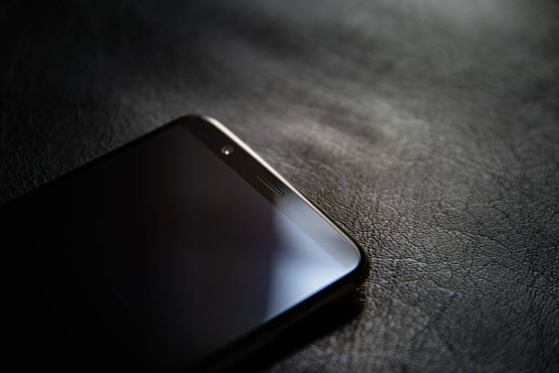 istock High Angle View Of Smart Phone On Table 1069727824