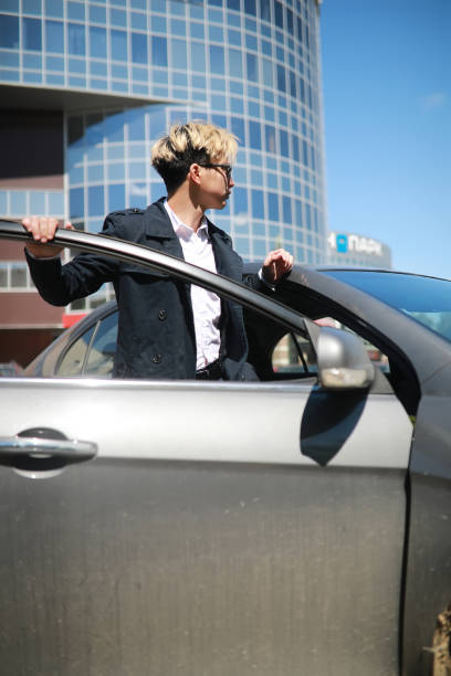 istock Man with car in the street 1069729280