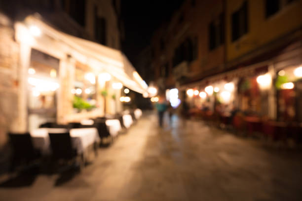 istock Venice night street blurred background 1069734644