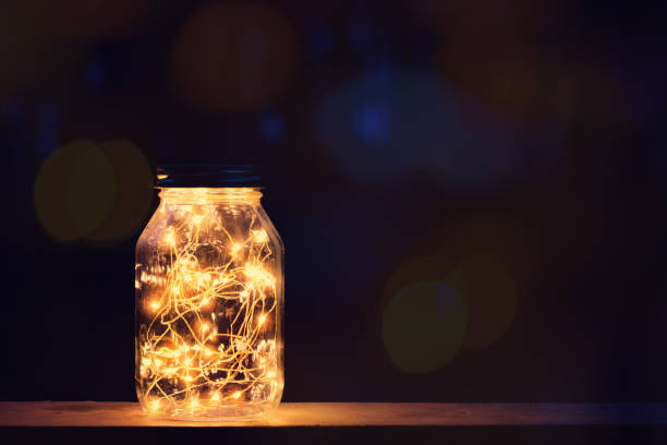 istock Lights in old retro style lantern with sparkling bokeh lights 1069734646