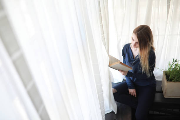 istock Young girl at home relaxing 1069734872