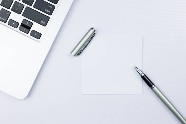 istock Top view of office stuff with laptop 1069735270