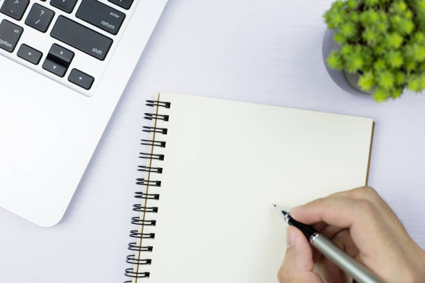 istock Top view of office stuff with laptop 1069735332