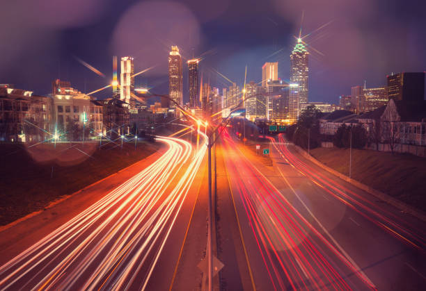 istock Atlanta city night skyline with bokeh lights 1069735404