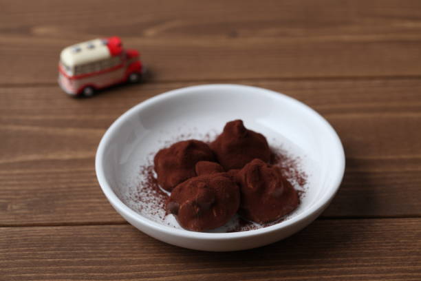 istock chocolate ganache crunch on wooden table 1069737342