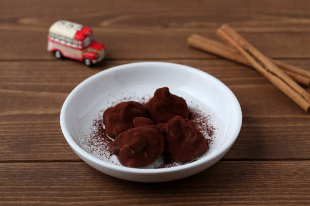 istock chocolate ganache crunch on wooden table 1069737536