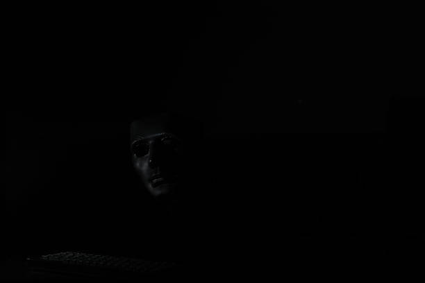 istock Black mask in the dark ritual and mystery 1069742400