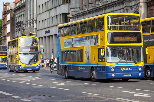 Dublin. Ireand - July 05 2018: Row of Dublin buses in a city centre street in Dublin, Ireland