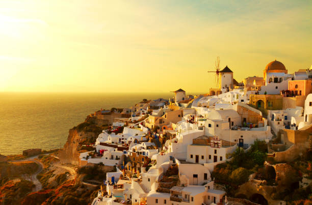 istock windmill of Oia at sunset, Santorini 1069745282
