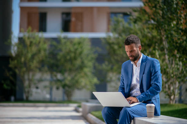 istock Handsome businessman working on a coffee break 1069749824