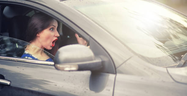 istock Girl driving a car bad emotions 1069750118