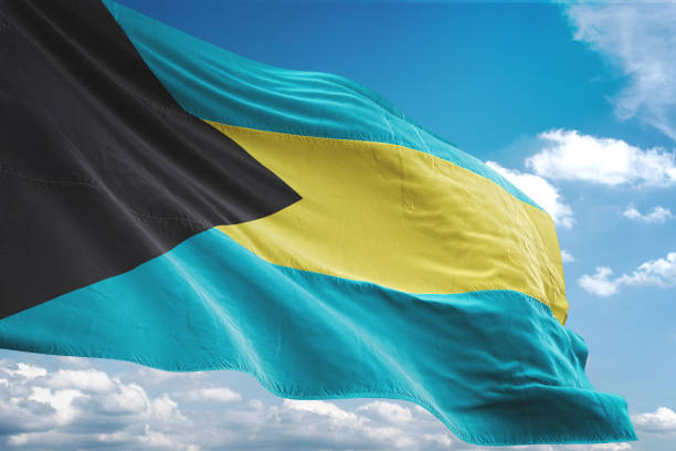 Bahamas flag waving cloudy sky background realistic 3d illustration