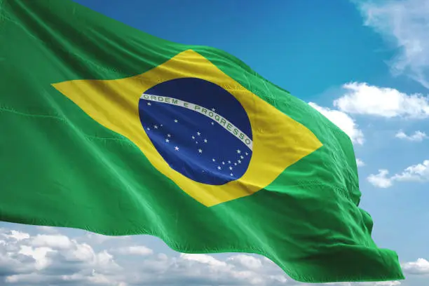 Brazil flag waving cloudy sky background realistic 3d illustration