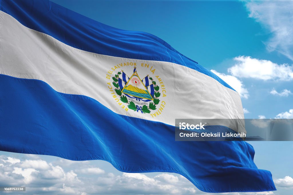 El Salvador flag waving cloudy sky background El Salvador flag waving cloudy sky background realistic 3d illustration El Salvadoran Flag Stock Photo