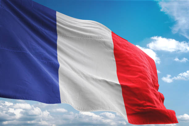 France flag waving cloudy sky background France flag waving cloudy sky background realistic 3d illustration tricolor stock pictures, royalty-free photos & images