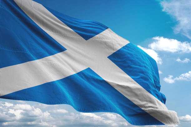 Scotland flag waving cloudy sky background Scotland flag waving cloudy sky background realistic 3d illustration coat of arms photos stock pictures, royalty-free photos & images