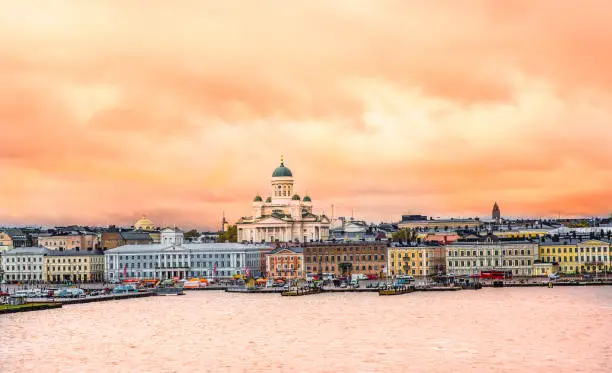 Ariel panoramic view of Helsinki at sunset with a Cathedral church and Market Square area on the shore of Baltic Sea in Helsinki, Finland.