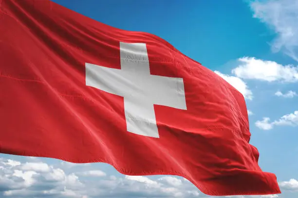 Switzerland flag waving cloudy sky background realistic 3d illustration