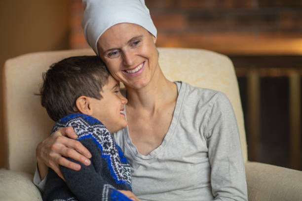 istock Mother with cancer embraces her young son 1069761032