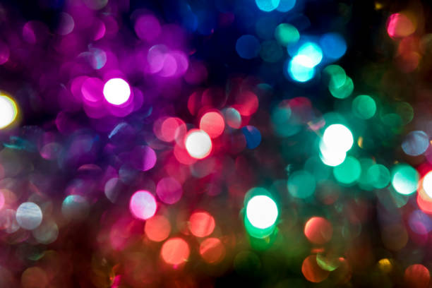 istock Colorful circles of light abstract background. 1069765062