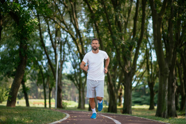 istock Sports man training in the park 1069766974