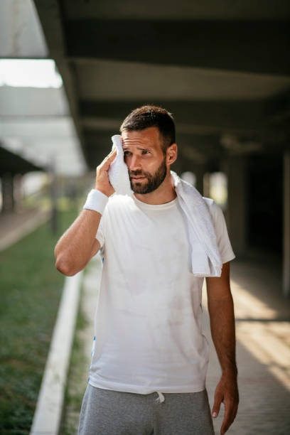 istock Young sports man training outdoors 1069772478