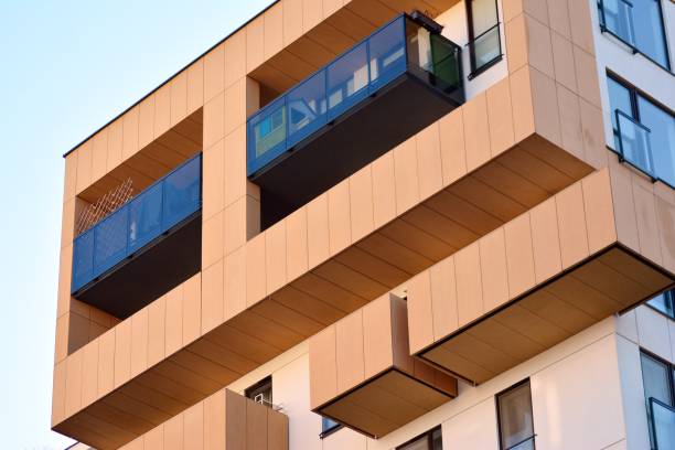 istock Fragment of a facade of a building with windows and balconies. 1069772848
