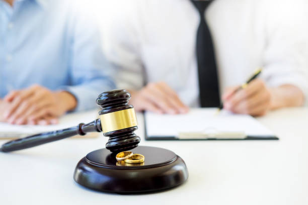 istock Midsection Of Judge And Colleague On Table 1069773396