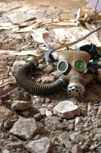 istock gas mask lies on the broken stone floor 1069778056
