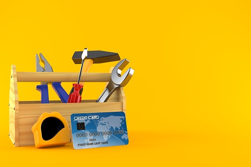 Toolbox with credit card isolated on orange background. 3d illustration