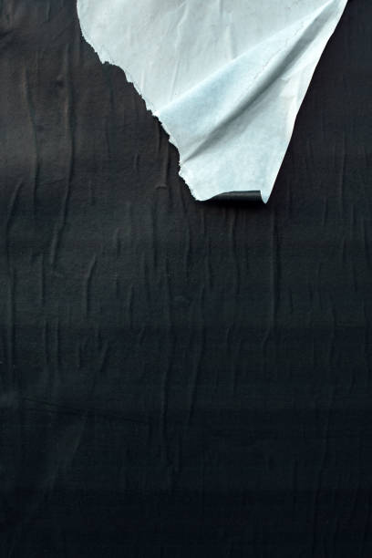 istock Torn ripped black and white poster paper 1069782716