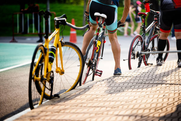 istock Low Section Of People Parking Bicycle On Road 1069782726