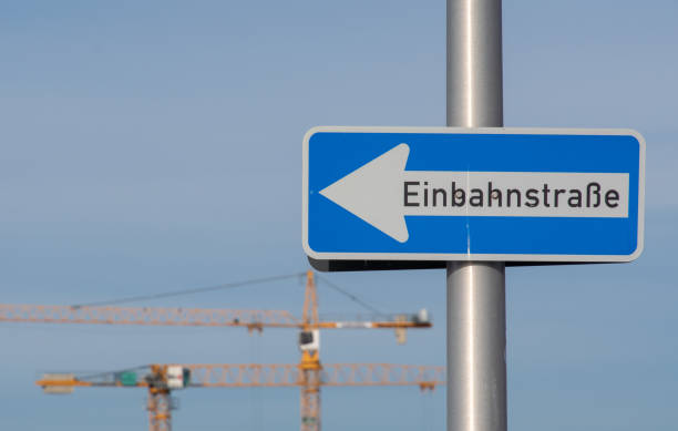 istock Low Angle View Of Road Sign Against Clear Blue Sky 1069786274