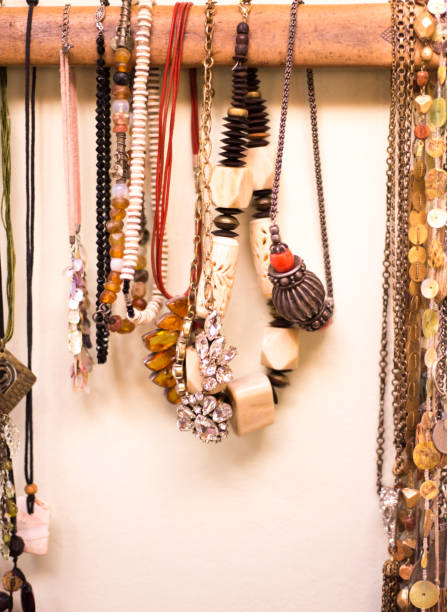 istock Necklaces Organized on Antique Wood 1069786322