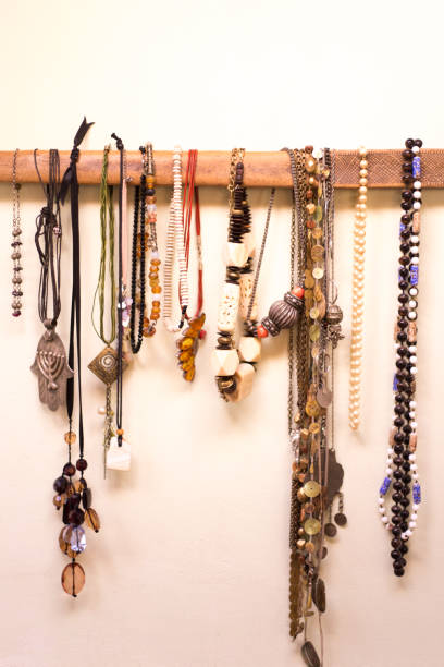 istock Necklaces Organized on Antique Wood 1069786716