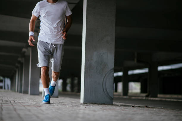 istock Young sportsman on training outdoors 1069787932