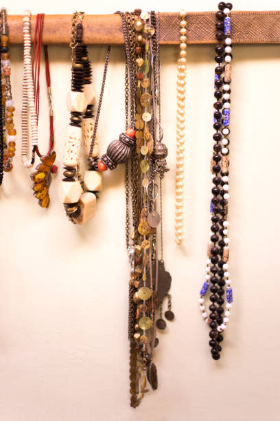 istock Necklaces Organized on Antique Wood 1069787970