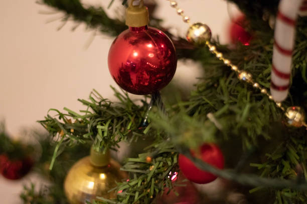 istock christmas decoration on the tree with lights 1069788742