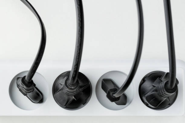 istock a lot of plugs connected in an extension cord on a white backgro 1069791412