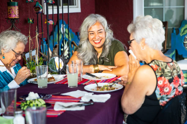 istock Mexican Family eating Dinner 1069793820