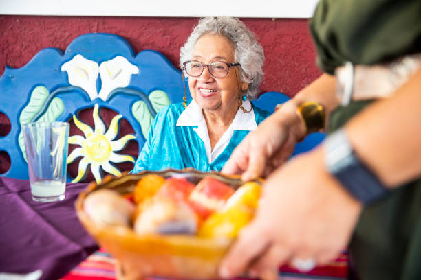 istock Mexican Family with Sweet Bread Pan Dulce 1069798250