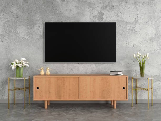 istock Wide screen TV in living room, loft style, 3D rendering 1069798498