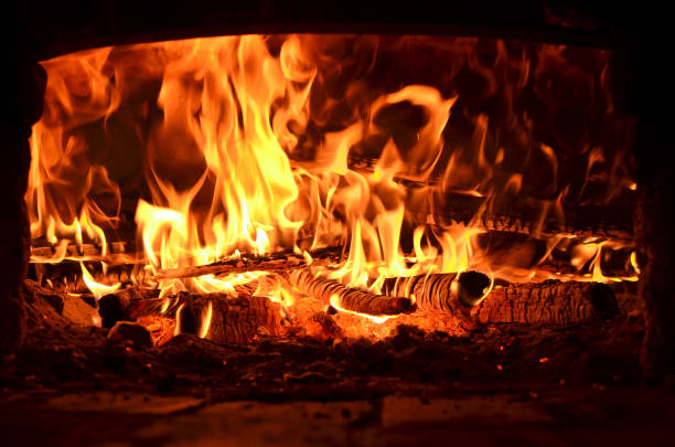 istock wood burning in the fireplace close-up 1069804970