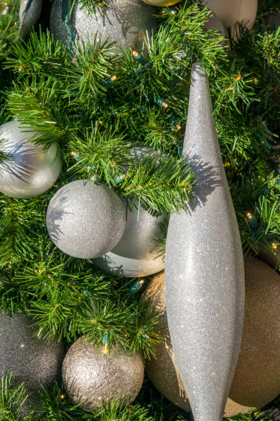 istock close-up of silver christmas decorations on a tree vertical ornate 1069805018