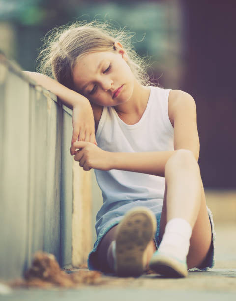 istock girl sad portrait 1069807038