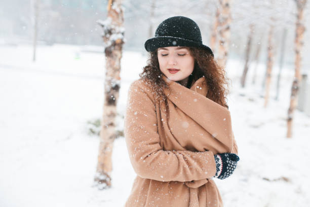 Woman in the Snow stock photo