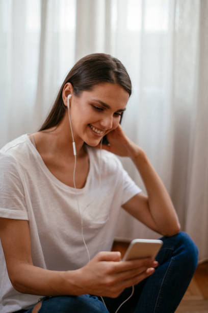 istock Beautiful young woman resting at home 1069849682