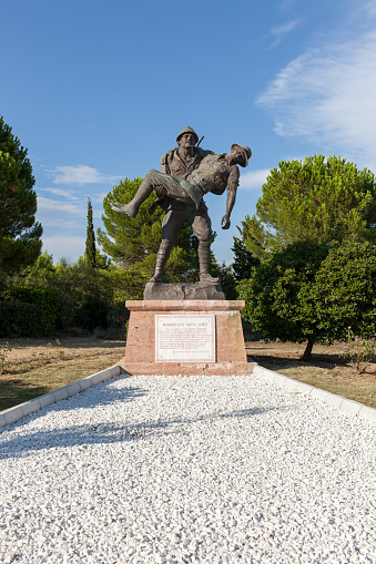 Canakkale, TURKEY - July 28, 2018 : Monument of a Turkish soldier carrying wounded Anzac soldier at Canakkale (Dardanelles) Martyrs' Memorial, Turkey.